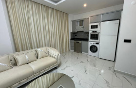 Квартира планировкой 1+1 в районе Махмутлар (B026)