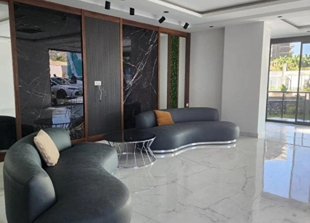 Квартира планировкой 1+1 в районе Махмутлар (BT067)